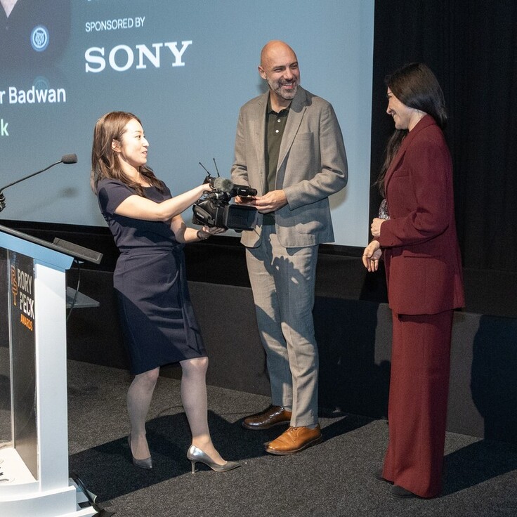 Sony's Hitomi Hamaba presenting the Sony Impact Award winners with their new Sony Z300 camera